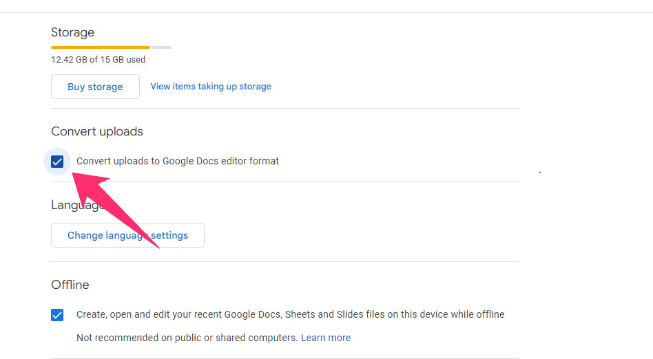 Arrow pointing on 'Convert Uploads to Google Doc editor format' checkbox