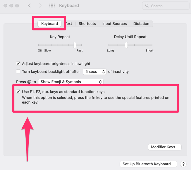 The screenshot shows Keyboard settings inside the system preferences on Mac computers. Arrow points to the checkbox that will enable standard F buttons functions